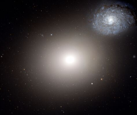 Galaxienpaar Arp 116 bestehend aus der elliptischen Galaxie M60 und der Sprialgalaxie NGC 4647